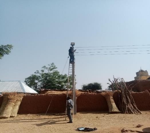 Installation of solar street lighting in the Garu village community.